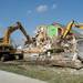 Crews work to salvage and clean up tornado-damaged homes in the Huron Farms subdivision in Dexter on Monday. Melanie Maxwell I AnnArbor.com